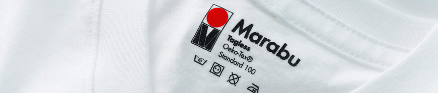  Image shows a printed T-shirt label as an example of the application of textile printing inks.